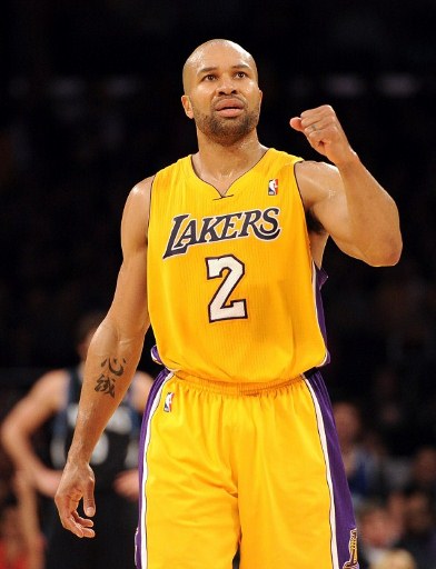TRADED. Derek Fisher #2 of the Los Angeles Lakers celebrates a score against the Minnesota Timberwolves during a 105-84 win at Staples Center on February 29, 2012 in Los Angeles, California. Harry How/Getty Images/AFP