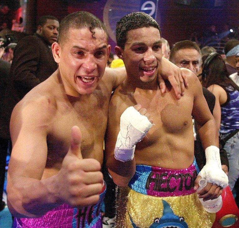 DEEP COMA. Puerto Rican boxer and father of undefeated super lightweight champion Hector "Macho" Camacho Jr. (R), Hector "Macho" Camacho Sr. (L) is in a coma after suffering from gun shot wounds. File photo by AFP.