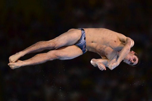US diver David Boudia competes in the men's 10m platform final during the diving event at the London 2012 Olympic Games on August 11, 2012 in London. AFP PHOTO / FABRICE COFFRINI