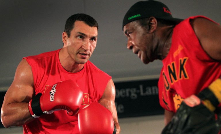 PRIZED PUPIL. Emanuel Steward helped skyrocket Wladimir Klitschko's boxing career as his trainer. Photo from AFP.