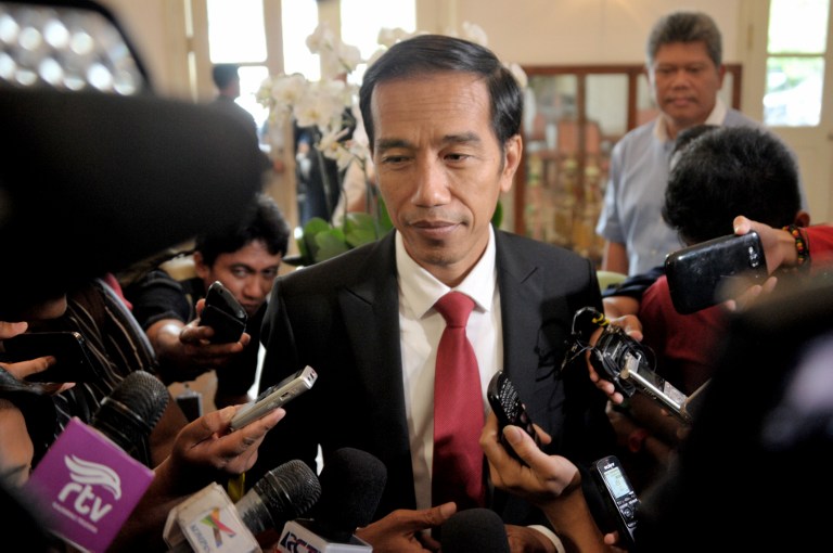 Presiden Joko ‘Jokowi’ Widodo dorong iklim investasi yang positif di Indonesia dengan dipercepatnya pemberian izin untuk investor. Foto oleh Bay Ismoyo/AFP