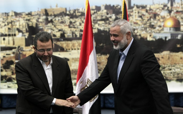 GAZA CITY. Palestinian Hamas leader in the Gaza Strip Ismail Haniya (R) receives Egyptian Prime Minister Hisham Qandil (L) in Gaza City on November 16, 2012. Egyptian premier Hisham Qandil vowed to intensify Cairo's efforts to secure a truce and end Israel's "aggression" in Gaza, after a strike killed two as he visited the strip. AFP File Photo by Mahmud Hams