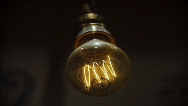 ENERGY EFFICIENCY. By installing energy efficient lightbulbs, the government stands to save P3.9 billion. Photo by AFP