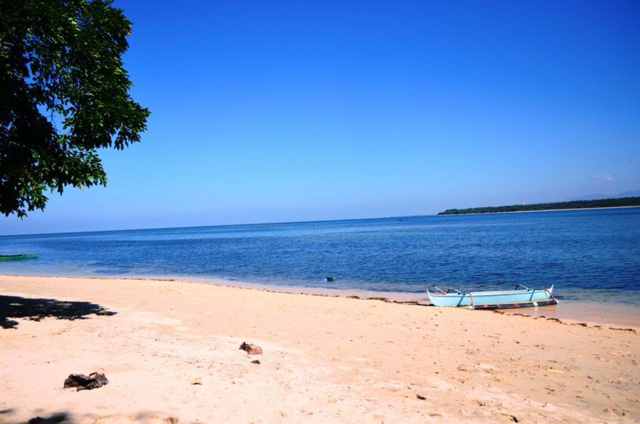 QUIET GETAWAY. The island is so serene you can just take it in at your own pace. Photo by Angel Valle Caronongan