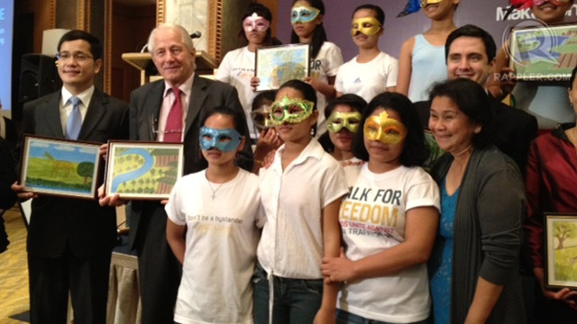 FIGHTING SLAVERY. Human trafficking survivors pose with representatives of groups seeking to fight modern-day slavery.