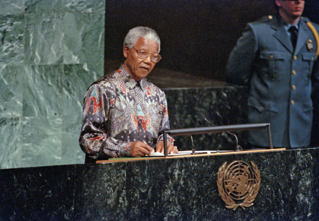 GAME-CHANGER. UNAIDS head Michel Sidibe credits former South African president Nelson Mandela for breaking the 'conspiracy of silence' surrounding HIV/AIDS. This October 23 1995 file photo shows Mandela speaking during a Special Commemorative Meeting of the United Nations General Assembly. Photo by UN Photo/G Kinch