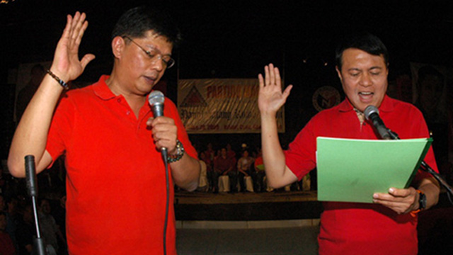 PARTY BUILDING. The NP fights it out in local free zones but works with the ruling party in the legislature. In photo: Cavite Rep Boying Remulla (left) and NP head Sen Manny Villar