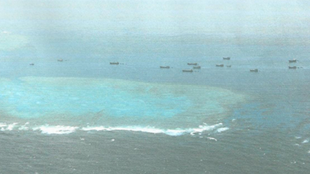 PAG-ASA ISLAND. 13 Hainan fishing vessels at 3 nautical miles east off Pag-asa Island. Photo taken by AFP Wescom, July 23