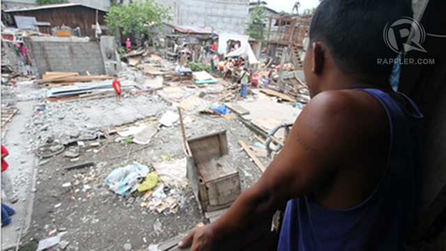 DEMOLISHED COMMUNITY. Deferred in 2011, a controversial demolition pushes through in Davao City. Photo by Karlos Manlupig