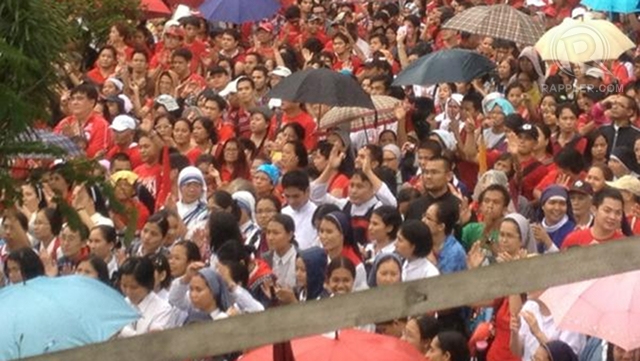 SEA OF RED. Wearing the so-called color of life, anti-RH bill protestors sing, dance, and pray during Saturday's rally. Photo by Paterno Esmaquel II