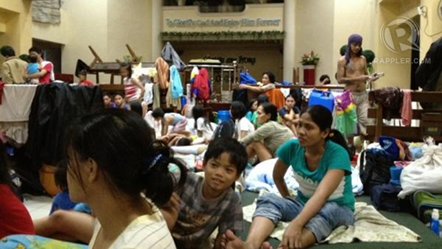 OPEN DOORS. A Baptist church turns into an evacuation center. Photo by Paterno Esmaquel II