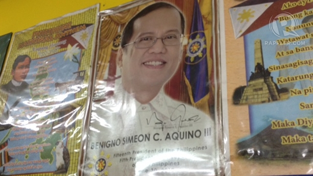 SPECIAL GUEST. President Benigno Aquino III's portrait serves as a reminder in the evacuation center. Photo by Paterno Esmaquel II