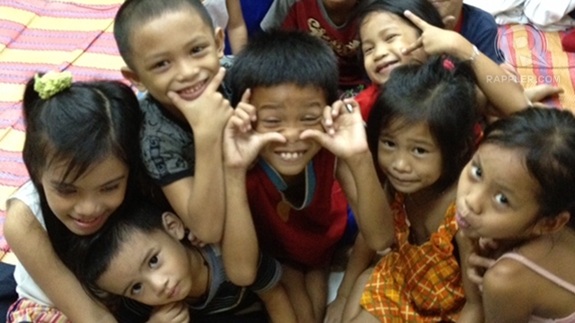 LIGHT MOMENTS. Children comprise most evacuees in Commonwealth. Photo by Paterno Esmaquel II