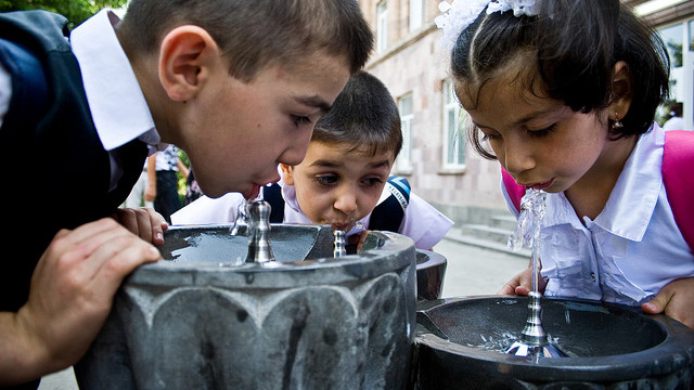 CLEAN START. Armenia children drink fresh water from a fountain built as part of an ADB funded project. All photos from the ADB