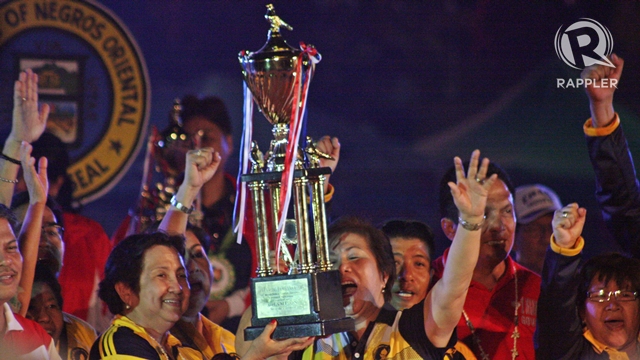 CHAMPS AGAIN. NCR officials receive the general championship trophy. Photo by Rappler/Kevin dela Cruz.