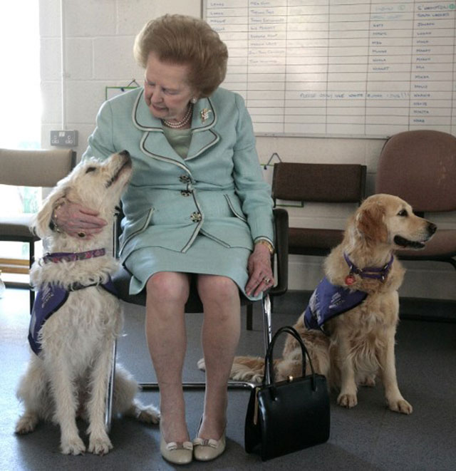 2009, June 2. Thatcher attends the opening of a the new Canine Partners training accommodation building at the National Training Centre in Heyshott in West Sussex. AFP/Shaun Curry