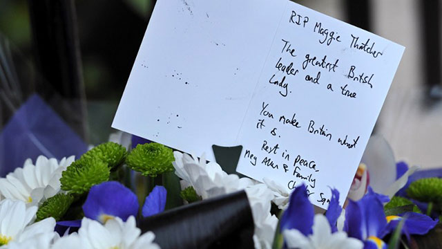 2013, April 8. A written tribute and flowers are pictured outside the home of former British Prime Minister Margaret Thatcher in central London, following her death earlier Monday AFP/Carl Court