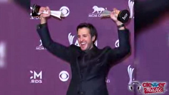 SURPRISE WINNER. Luke Bryan wins the coveted Entertainer of the Year, beating Taylor Swift and Blake Shelton. Screen grab from YouTube (ClevverMusic)