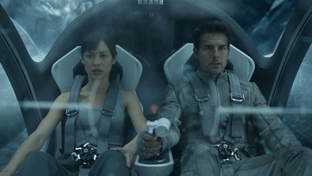 BRACE YOURSELF. Olga Kurylenko and Tom Cruise in 'Oblivion.' Photo from the 'Oblivion' Facebook page