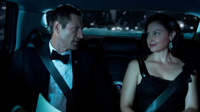 UNEASY RIDE. Aaron Eckhart and Ashley Judd are secure but not safe in 'Olympus Has Fallen'