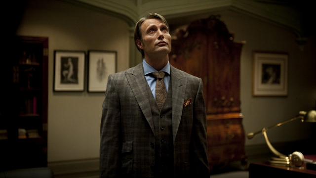 JUST WHAT IS HE UP TO? Things are looking up for Mads Mikkelsen as Dr. Lecter in ‘Hannibal.’ Photos from AXN and the ‘Hannibal’ Facebook fan page