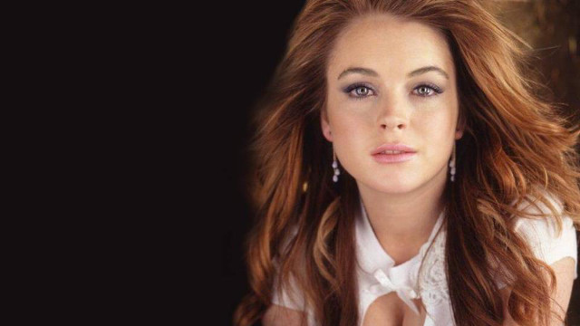 LOHAN IN HOT WATER AGAIN. New legal problems for Lohan after failing to check into rehab. Photo from the 'Lindsay Lohan' Facebook page