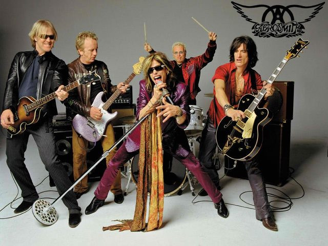 A MOUTHFUL AND AN EARFUL. Aerosmith’s Tom Hamilton, Brad Whitford, Steven Tyler, Joey Kramer, and Joe Perry (from left) rock on 43 years later. Photo from the Philippine Concerts Facebook page 