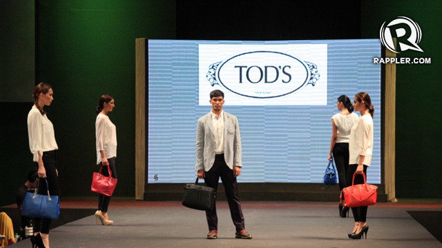 FAVORITE LOOK: CENTER. While Tod’s gives us bags for women, our favorite is the bag for men. It gives a very professional look, while providing compartments for all business needs.