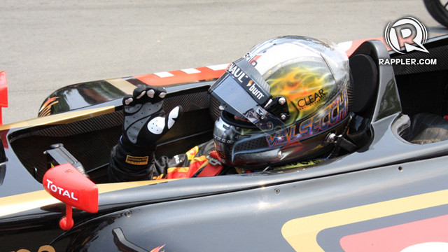 Davide Valsecchi, 2012 GP2 champion, in the two-seater racecar ready to take some guests for a ride