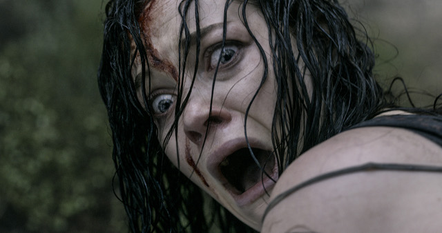 LOOK AWAY, IF YOU CAN. Lead star Jane Levy acts out the likely reaction of many an ‘Evil Dead’ viewer