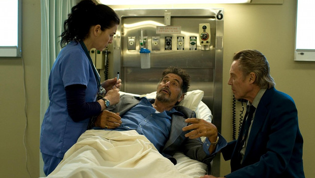 SENIOR MOMENT. Julianna Margulies, Al Pacino, and Christopher Walken attend to an age-related emergency in ‘Stand Up Guys’