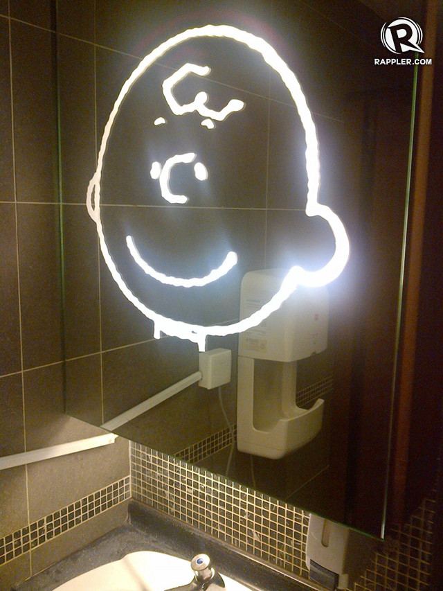 LOOK LIKE CHUCK. Even the bathrooms are Peanuts-themed! 