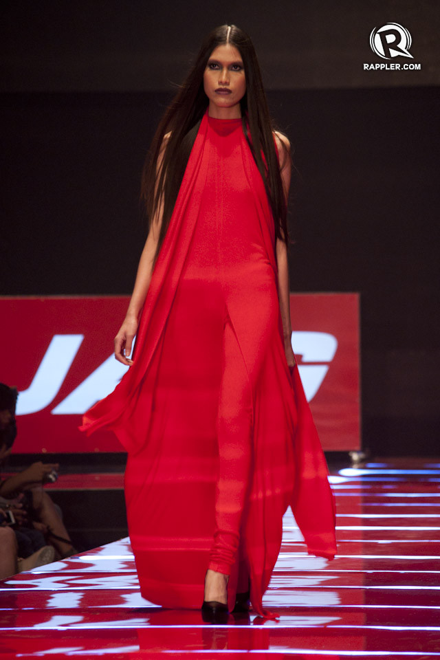 HIGH IMPACT. Norman Noriega spices up this ultra-modern dress with a punch of red