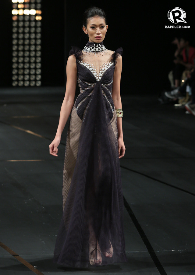 BEADED DECOLLETAGE. This gown's embellishments elongate and draw attention to the neck