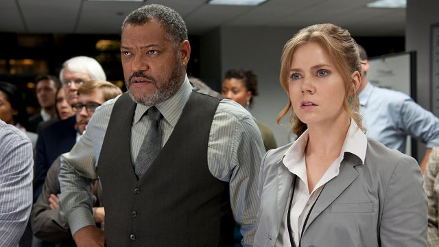 THE JOURNALISTS. Laurence Fishburne plays Daily Planet editor-in-chief Perry White while Amy Adams plays journalist Lois Lane