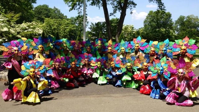 RAINBOW SPECTRUM. The Bacolod Masskara NY Edition dance group wear their colorful costumes and masks proudly