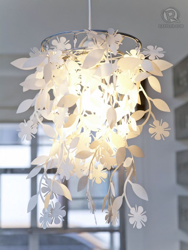 This floral cutout living area lamp is one of the more feminine elements in Nikki and Mikee's home