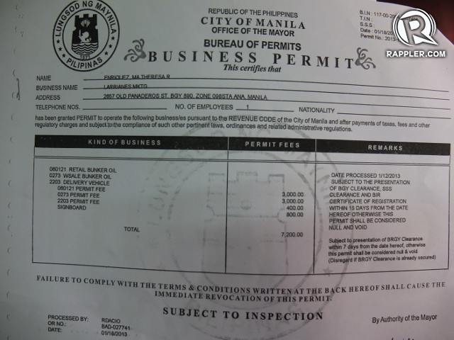 BUSINESS PERMIT. The lawyer of the owner of Larraine's Marketing oil depot presented this document