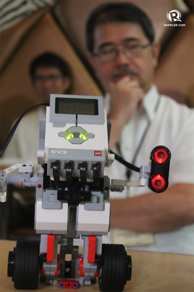 BALANCE. Gyroboy is the third and latest technology in Lego robotics. Usec Fortunato De La Peña observes in the background. Photo by Jee Geronimo/Rappler