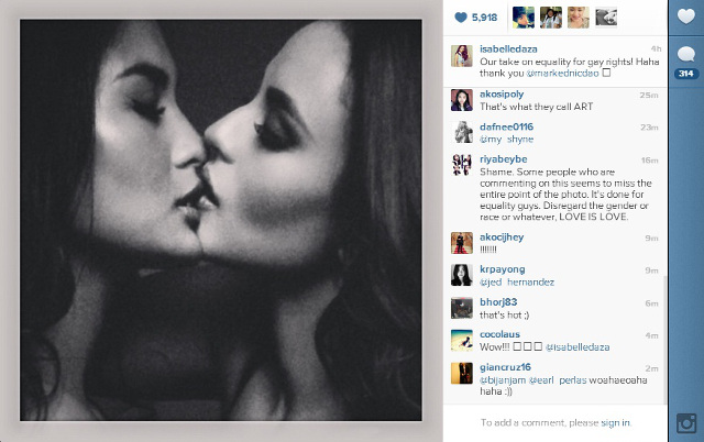SEALED WITH A KISS. It girls Isabelle Daza and Georgina Wilson pucker up for gay rights. Screen grab from Isabelle Daza's Instagram isabelledaza