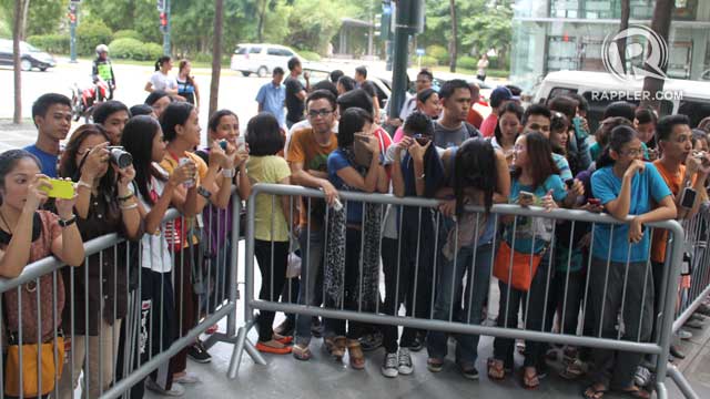 'FRIENDS, LOVERS, FAMILY.' Fans waiting to catch a glimpse of their idol