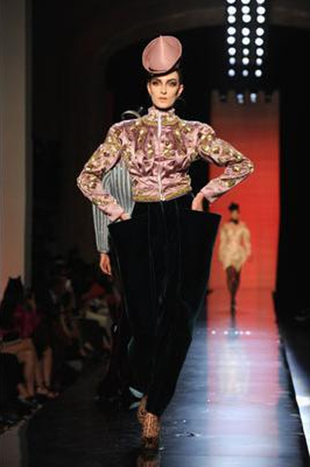 POCKETS FULL OF STYLE. Jean Paul Gaultier uses the outrageously proportioned pockets of clowns in his new collection. Photo from www.ottawacitizen.com