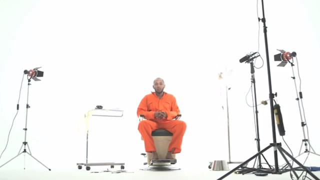 PROCEDURE. Mos Def presents reenactment of force-feeding. Screenshot from YouTube (The Guardian)
