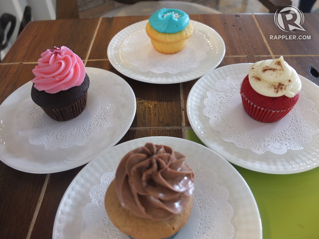 PASTRY GEMS. White plates hold bestselling cupcakes including Red Velvet Vixen (rightmost)