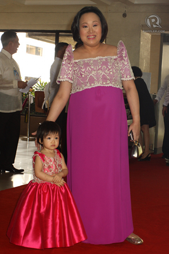 THERESA PANCHO, wife of Rep Pedro M Pancho of Second District Bulacan, in a maternity terno by Paul Cabral