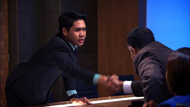 ORGASMIC PROPORTIONS. Jonathan Yabut earns the congratulatory 'You’re hired' handshake from his new boss, Tony Fernandes