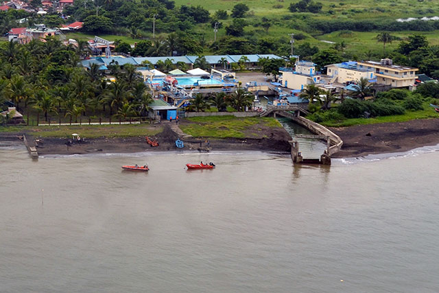 SOURCE OF SPILL. A pipeline leading to the Petron oil depot in Rosario, Cavite is the source of an oil spill that caused 500,000 liters of oil to stain Manila Bay. Photo from EPA/PCG