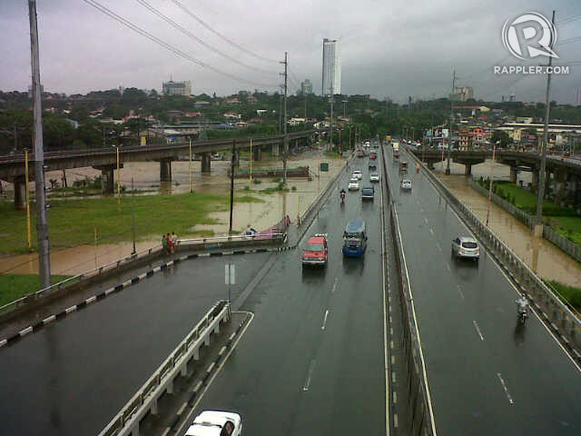 SWELLED BY RAIN. An overflowing Marikina River viewed from Marcos Highway near SM Marikina. Photo courtesy of Krista Garcia