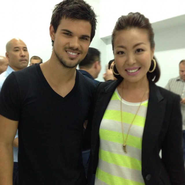 OH, HI, TAYLOR! A more composed Sam Oh with Taylor Lautner backstage at a Bench show. All photos except those with credits courtesy of Sam Oh