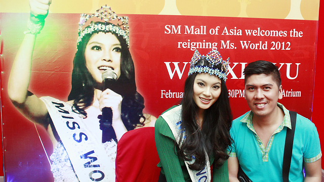 REIGNING MISS WORLD. Sash Factor's Dennis Natividad [right] with Miss World 2012 Wenxia Yu. Photo courtesy of Dennis Natividad